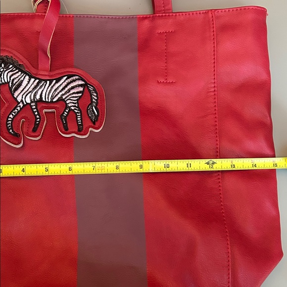 Saks Fifth Avenue Red and Burgundy Tote with Zebra Charm - Picture 9 of 11